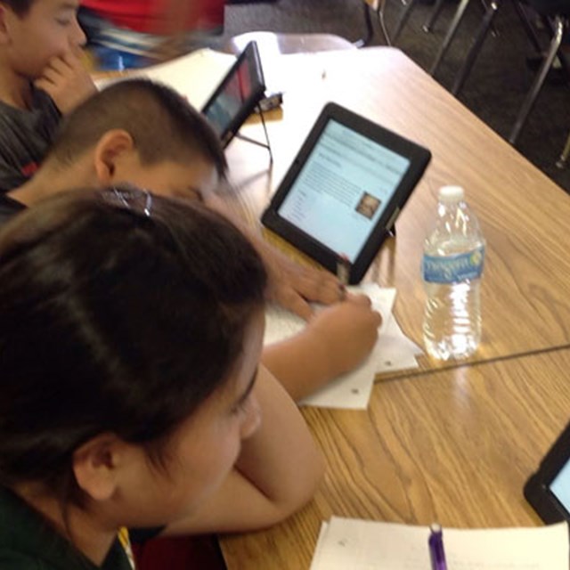 Students use tablets to broaden their understanding of in-class topics!